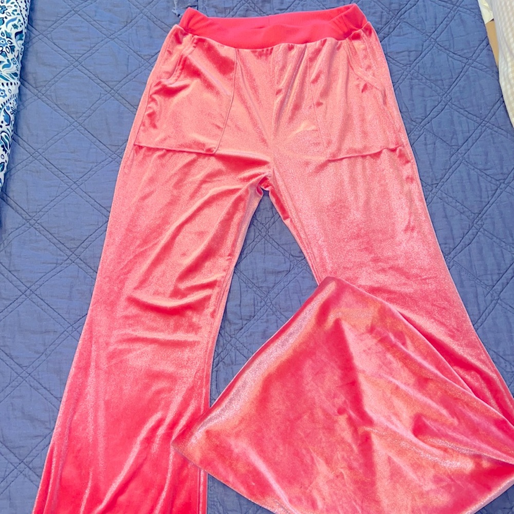 Super cute and fun hot pink track suit with big flare pants!